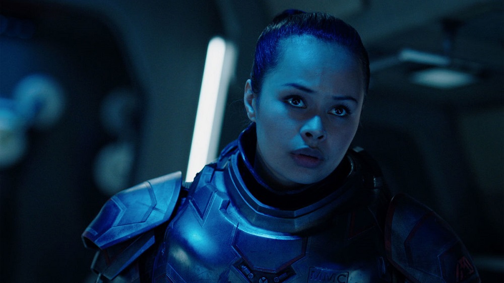 Bobbie Draper wearing Martian armor while looking pensive on The Expanse.
