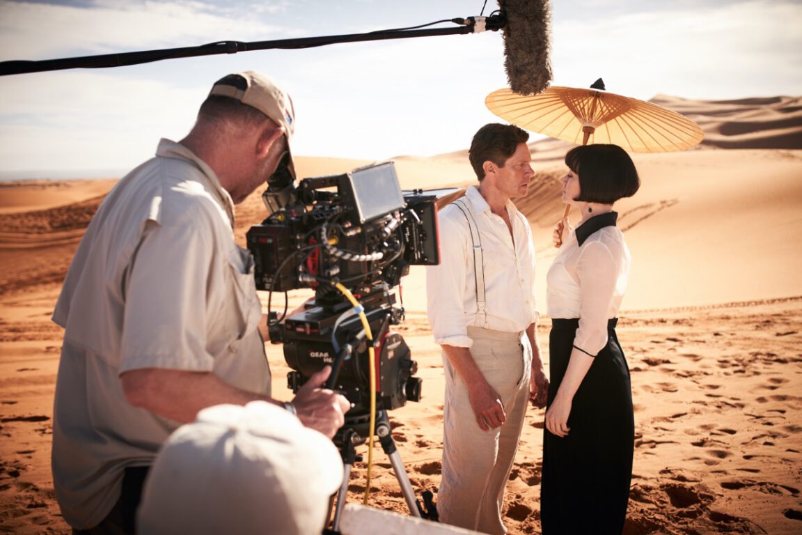 Miss Fisher and the Crypt of Tears Behind the Scenes: Brendan Shaw, Essie Davis and Nathan Page. Image Copyright Every Cloud Productions and all3media international 