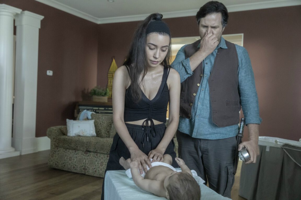 Rosita Espinosa gets help with Coco from Eugene Porter