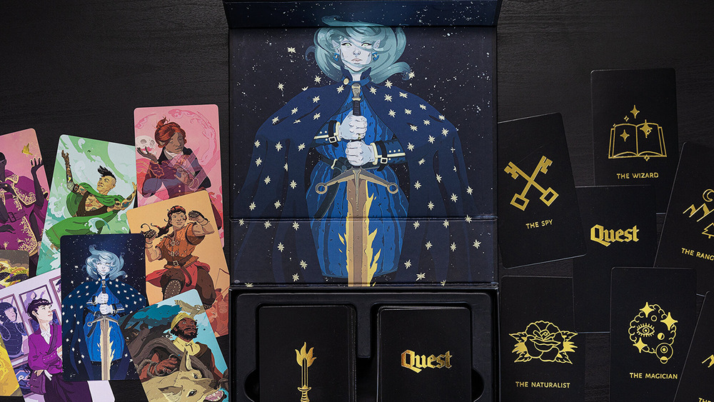 The Quest RPG cover, with cards from the Core Deck and cards with creatures and treasures from the Adventure Deck expansion.