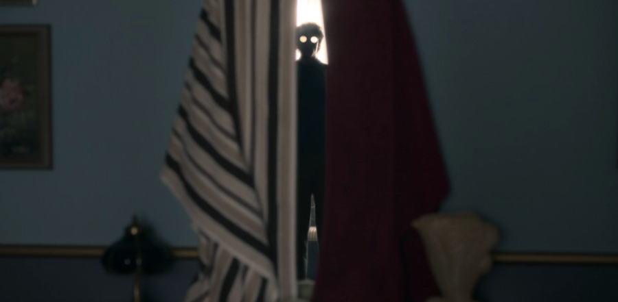 Eddie OMara, portrayed by Roby Attal, haunting Dani through a mirror in The Haunting of Bly Manor.