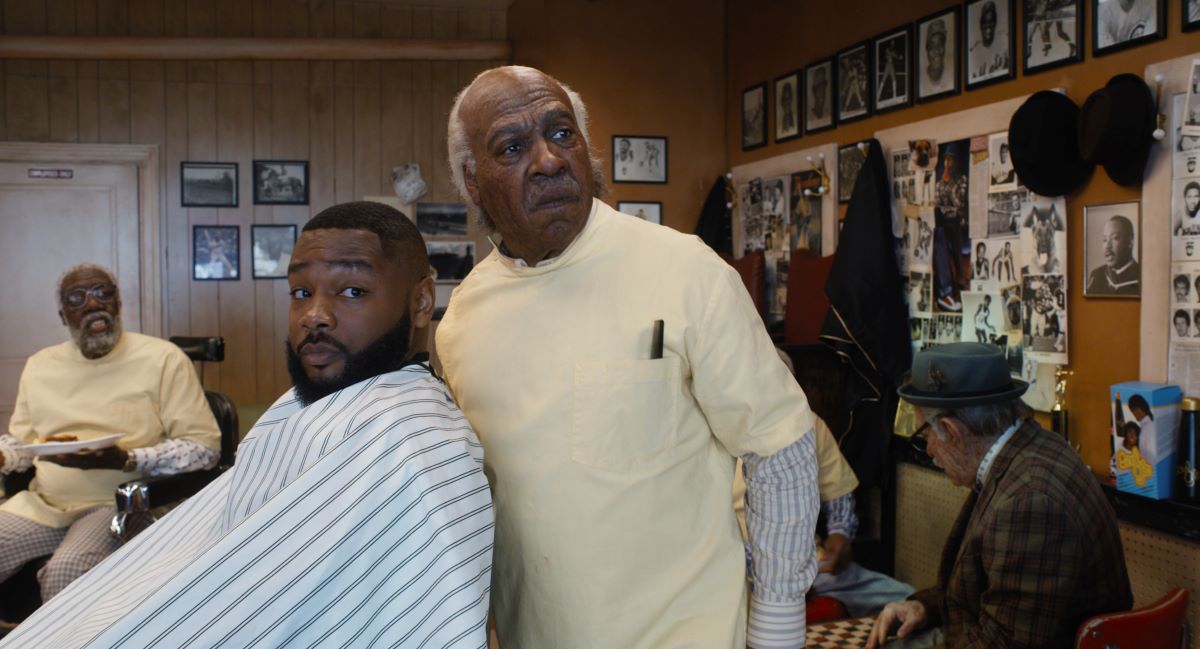 Still from barbershop in Amazon's Coming 2 America.