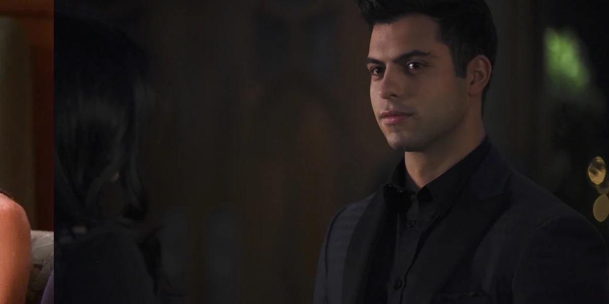 Raphael stares at someone off screen.