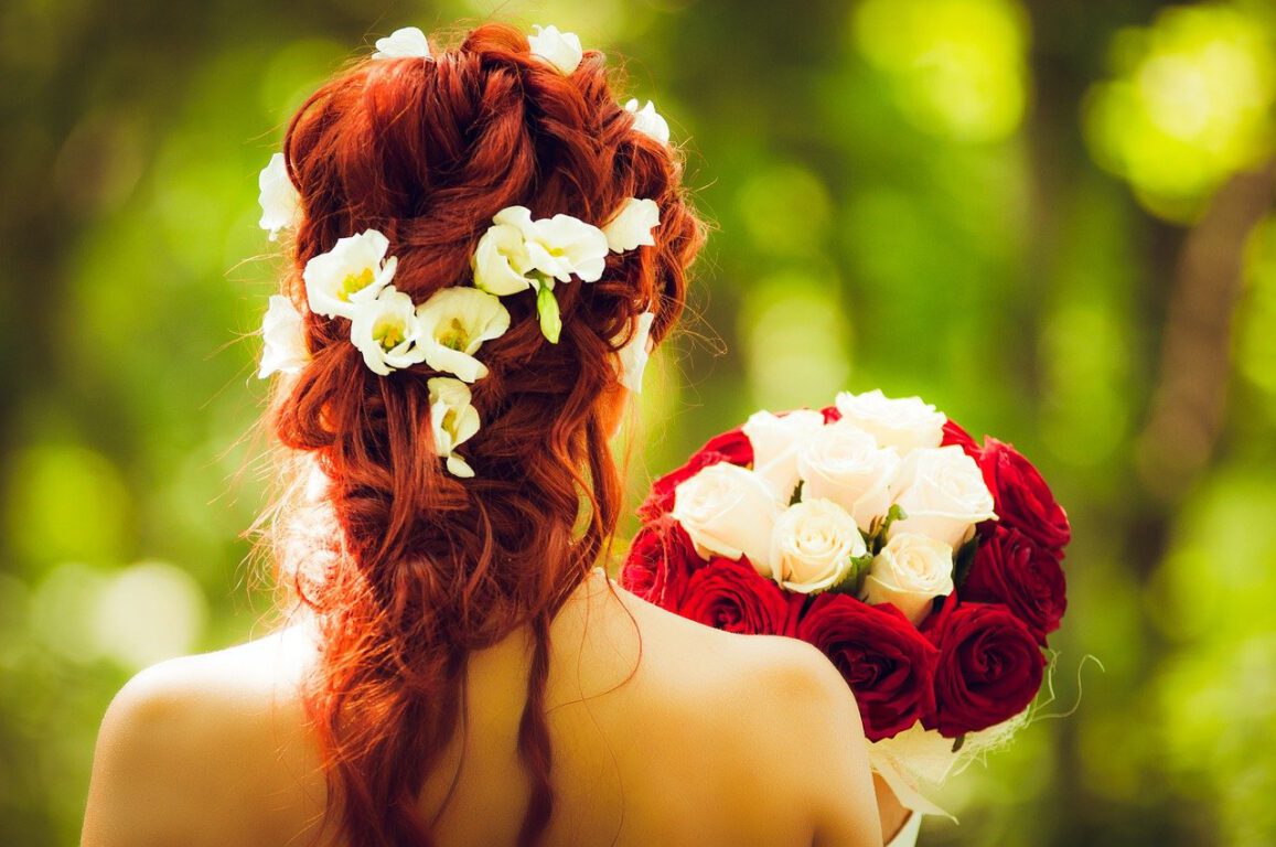bride holding roses