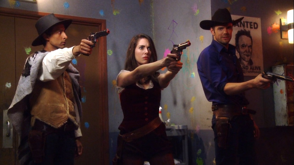 Still of Danny Pudi, Alison Brie, and Joel McHale in Community episode "A Fistful of Paintballs."