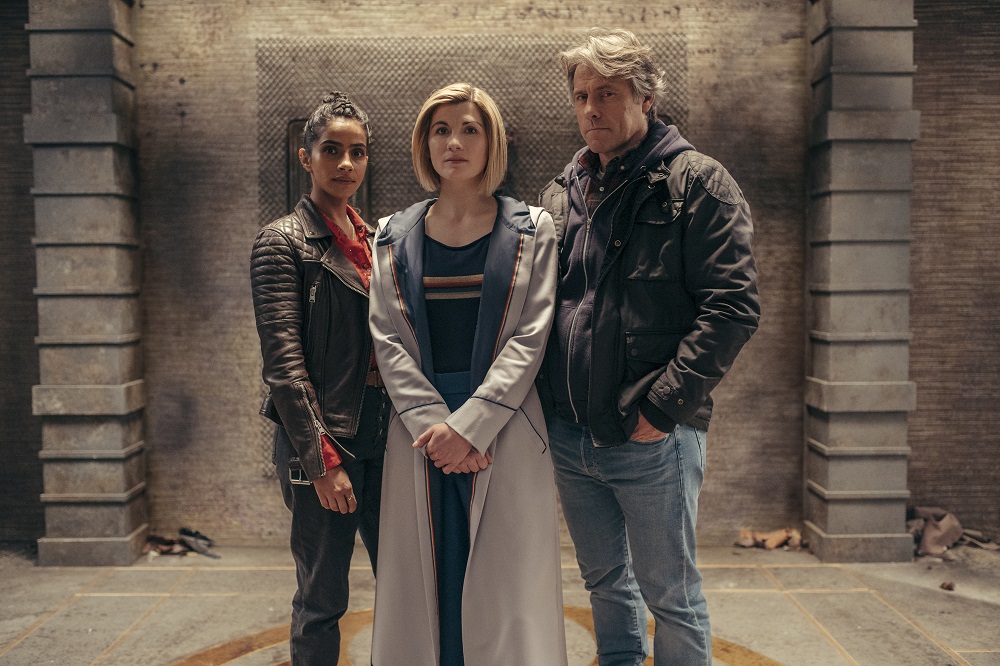 Still of Mandip Gill, Jodie Whittaker, and John Bishop in Doctor Who: Flux Season 13 Episode 1 The Halloween Apocalypse