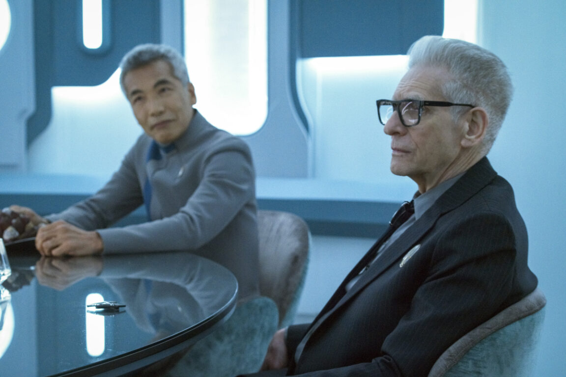 Hiro Kanagawa as Dr. Hirai and David Cronenberg as Kovich of the Paramount+ original series STAR TREK: DISCOVERY