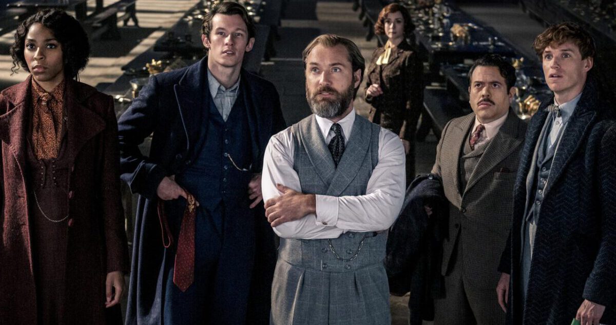 The cast of Fantastic Beasts: The Secrets of Dumbledore staring at something off camera.