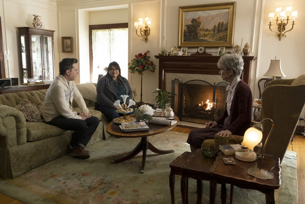 Nathan and Reagan visit Aunt Joan about the Rutherford family birth records on Rutherford Falls