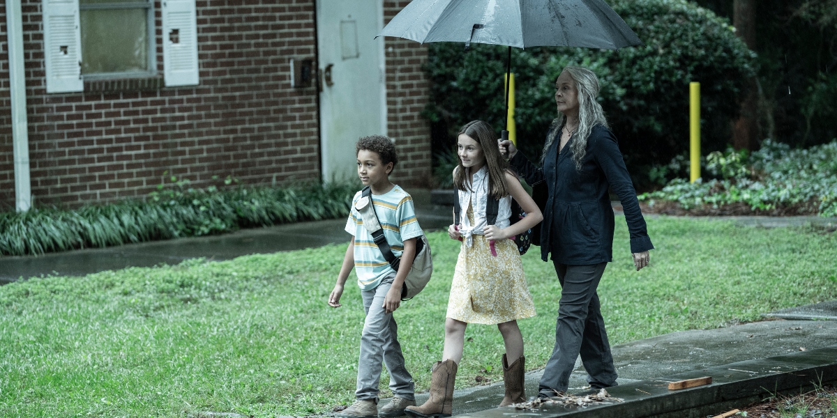 Carol accompanies the Grimes children to school on The Walking Dead