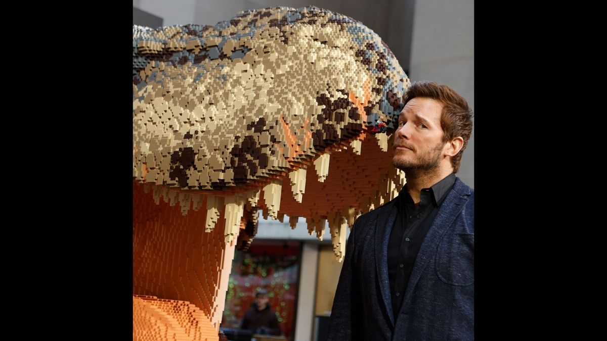 Chris Pratt close up with LEGO statue