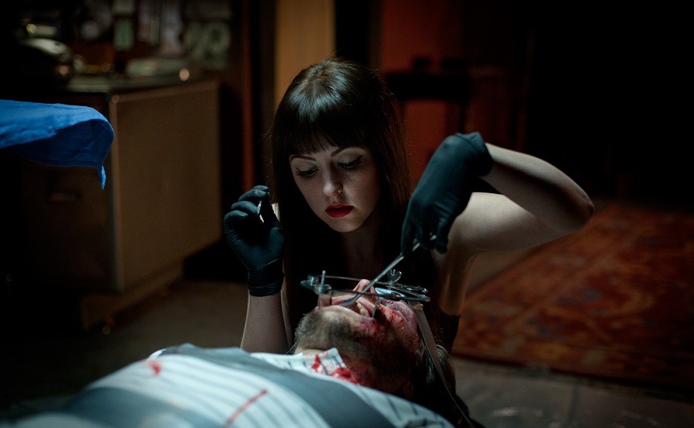 Mary performs body mod surgery on Dr. Grant in American Mary.