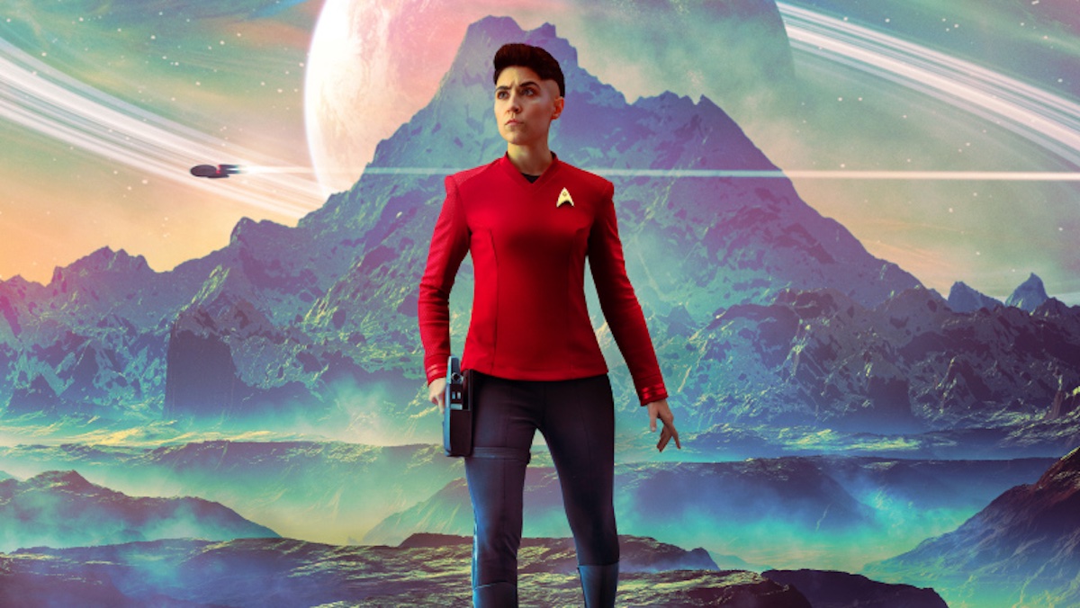 Ortegas (Melissa Navia) poses in front of the Enterprise and an alien landscape.