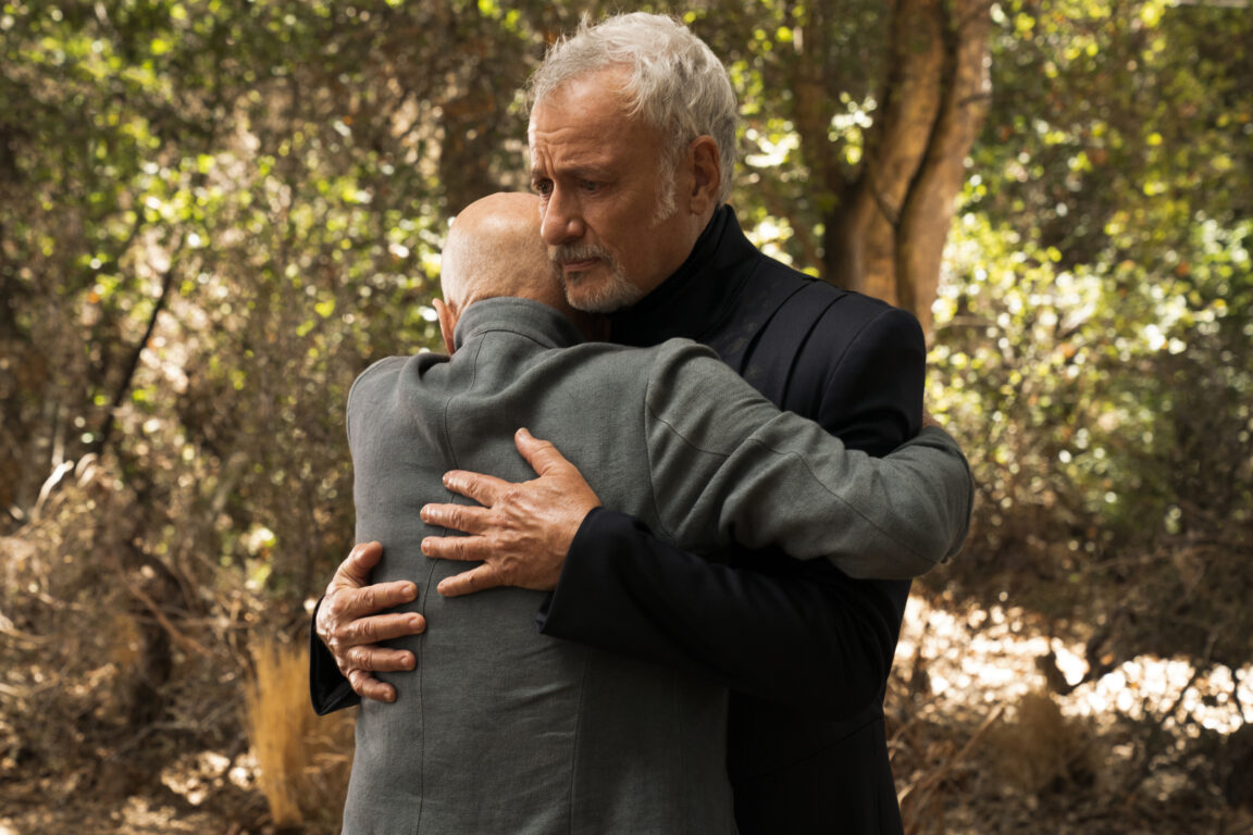 Picard embraces an emotional Q outside the chateau in what is to be their final meeting. 