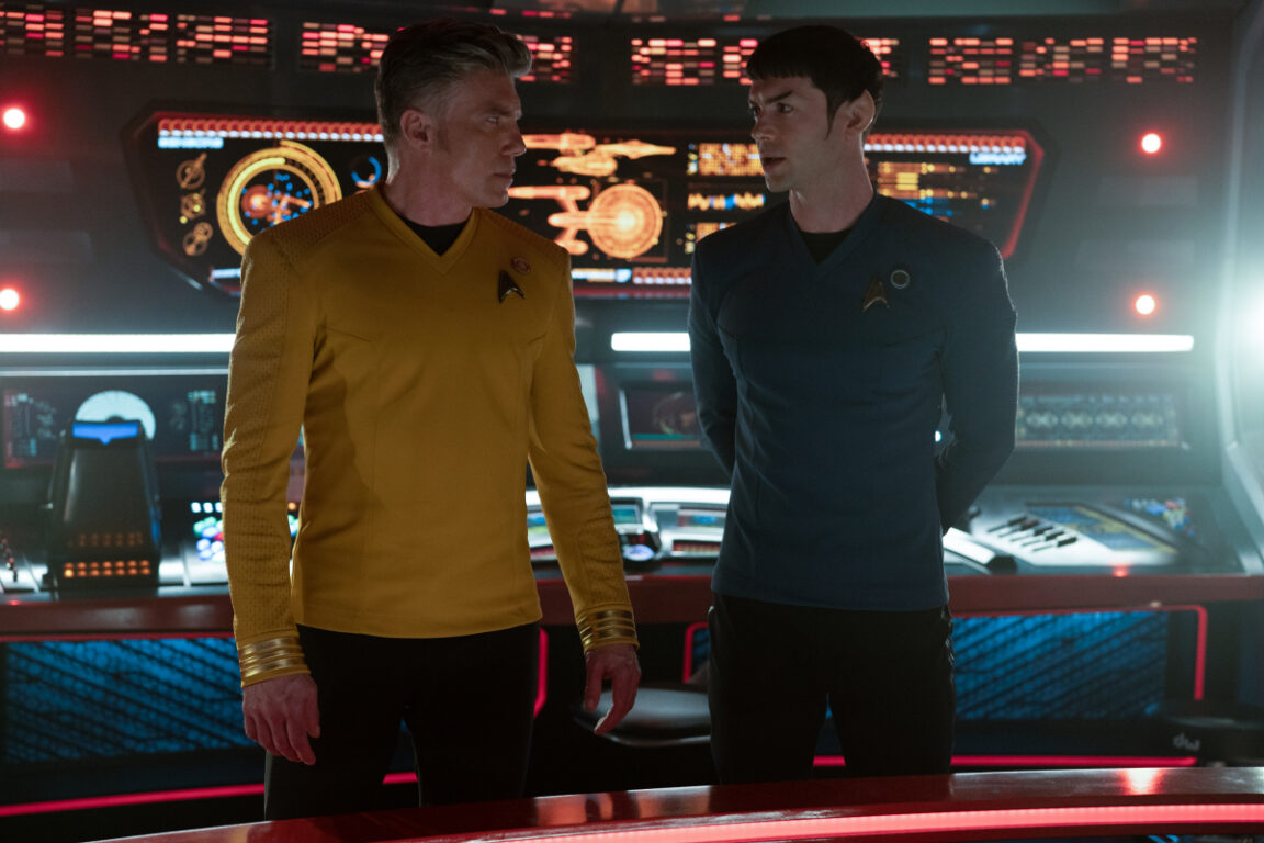 Anson Mount as Pike and Ethan Peck as Spock on the bridge of the Enterprise.