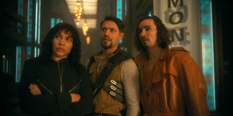 Allison, Diego and Klaus standing in a hallway while staring at something off camera on The Umbrella Academy Season 3 Episode 4 "Kugelblitz."