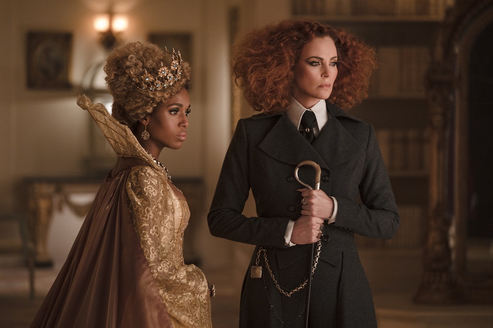 Professor Dovey and Lady Lesso wearing regal outfits and standing next to each other in The School for Good and Evil.