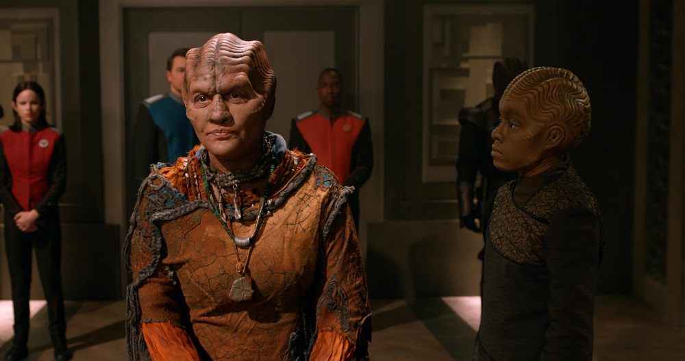 Heveena delivers a moving speech during a simulation of the Moclan trial while Topa observes in The Orville: New Horizons Season 3 Episode 5 "A Tale of Two Topas."