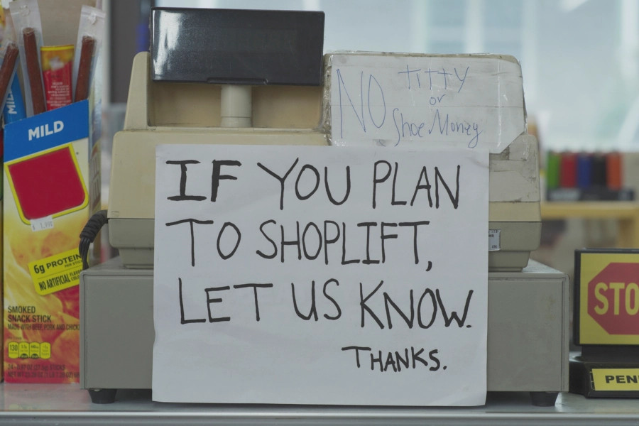 "If you play to shop life, let us know. Thanks" sign sitting in front of the register in Clerks III.