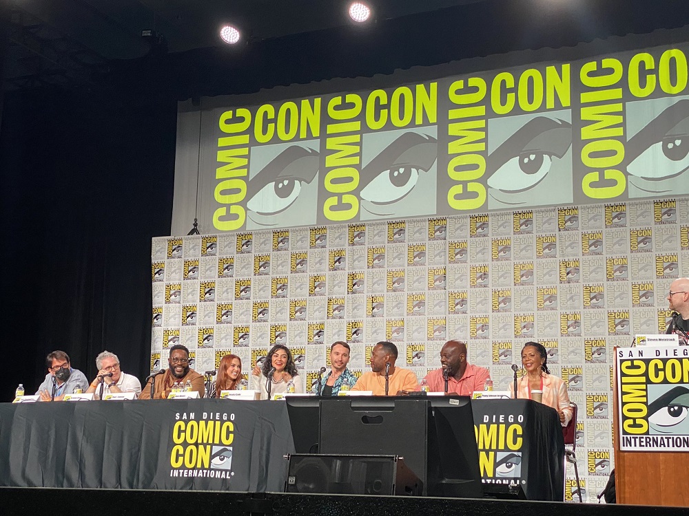 The cast of The Orville sitting on a panel at SDCC 2022.