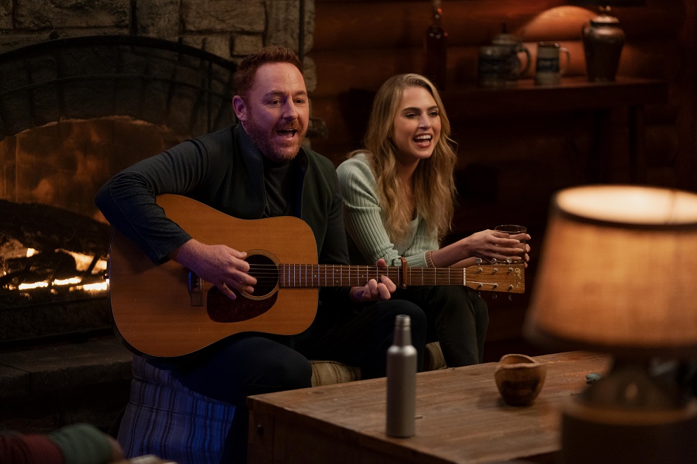 Lt. Gordon Malloy plays guitar and sings while Ensign Charly Burke harmonizes with him on The Orville: New Horizons Season 3 Episode 9 "Domino."