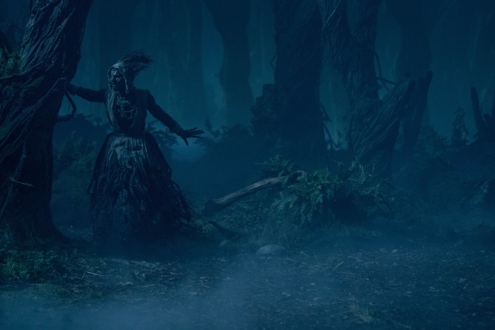 A ghostly witch moving throught the forest in Guillermo del Toro's Cabinet of Curiosities.