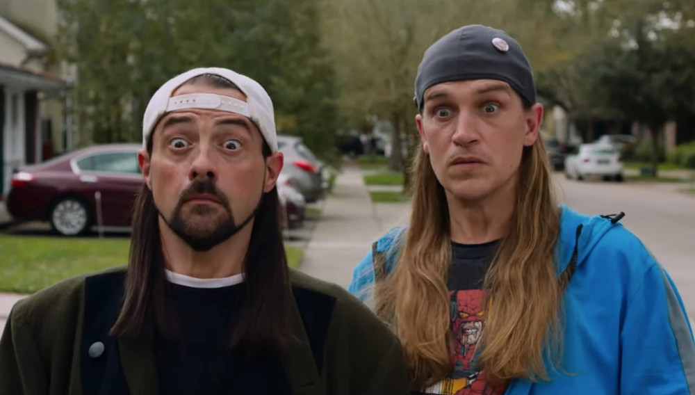 Silent Bob and Jay standing in the street.