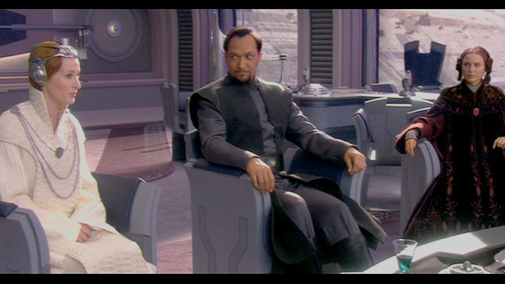 Mon Mothma, Bail Organa, and Padme Amidala, all in formal Senatorial robes,  sit in a Coruscant apartment. They are having a serious discussion.