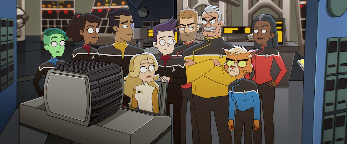 Noel Wells as Ensign Tendi, Tawny Newsome as Ensign Beckett Mariner, Eugene Cordero as Ensign Rutherford, Jack Quaid as Ensign Brad Boimler, Jerry O'Conell as Commander Ransom, Fred Tatasciore as Lieutenant Shaxs, Gillian Vigman as Doctor T'Ana and Dawnn Lewis as Captain Carol Freeman. They are looking over Doctor Gibson's shoulder as she gives them exposition on a computer screen.