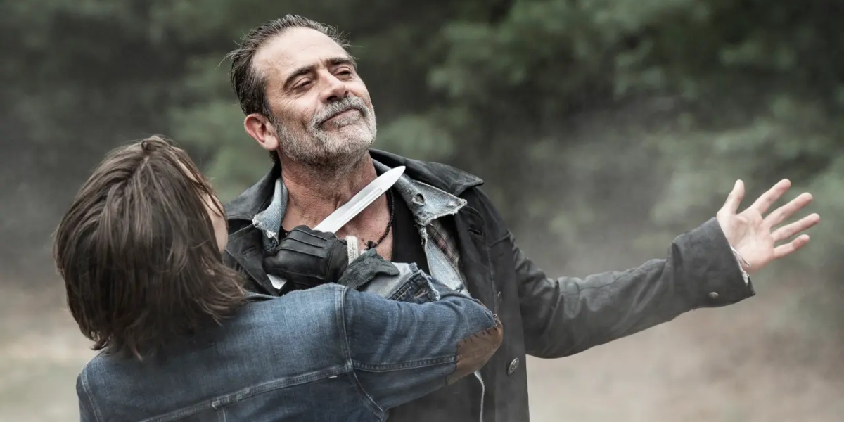 Maggie holds a knife to Negan's throat on The Walking Dead: Dead City