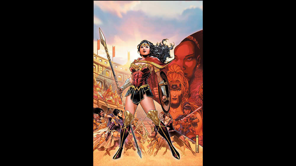 Wonder Woman, spear in hand and hair blowing in the wind, stands proudly before a chaotic scene of faces and fighting.