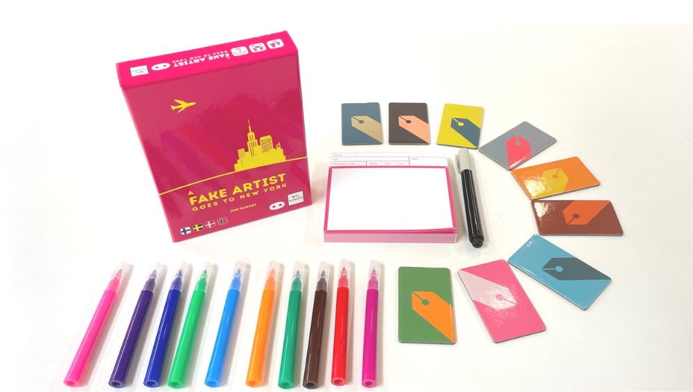 A Fake Artist Goes to New York box and drawing set on white background