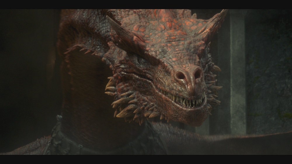 Caraxes, a red dragon with horns around his long neck, looks ready to feast in House of the Dragon.