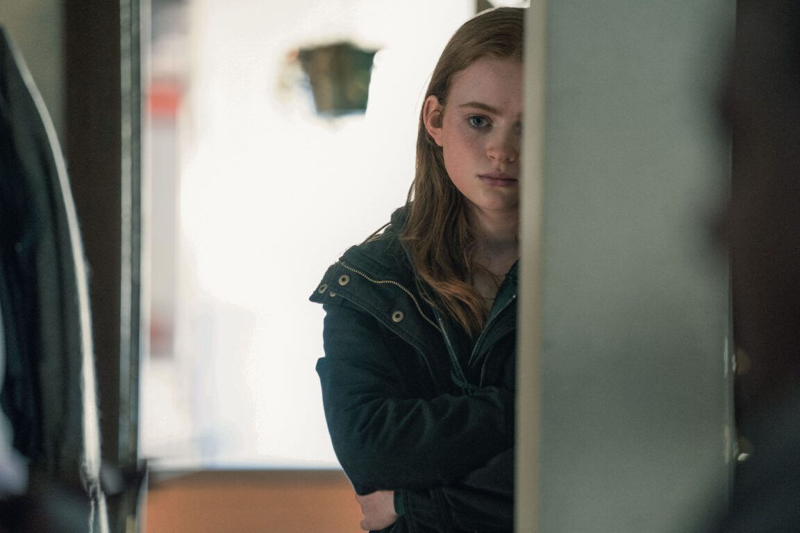 Sadie Sink looks around a corner in The Whale.