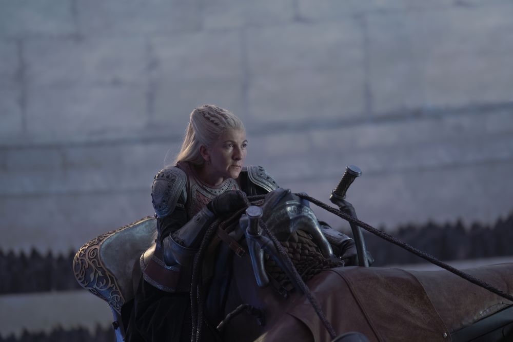 Rhaenys Targaryen rides her dragon Meleys into a dome-shaped building while holding the reins to a harness in House of the Dragon Season 1 Episode 9, "The Green Council."