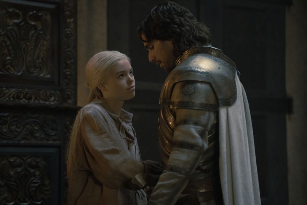 Rhaenyra Targaryen stands close to Ser Criston Cole while looking playfully into his eyes in House of the Dragon Season 1 Episode 4, "King of the Narrow Sea."