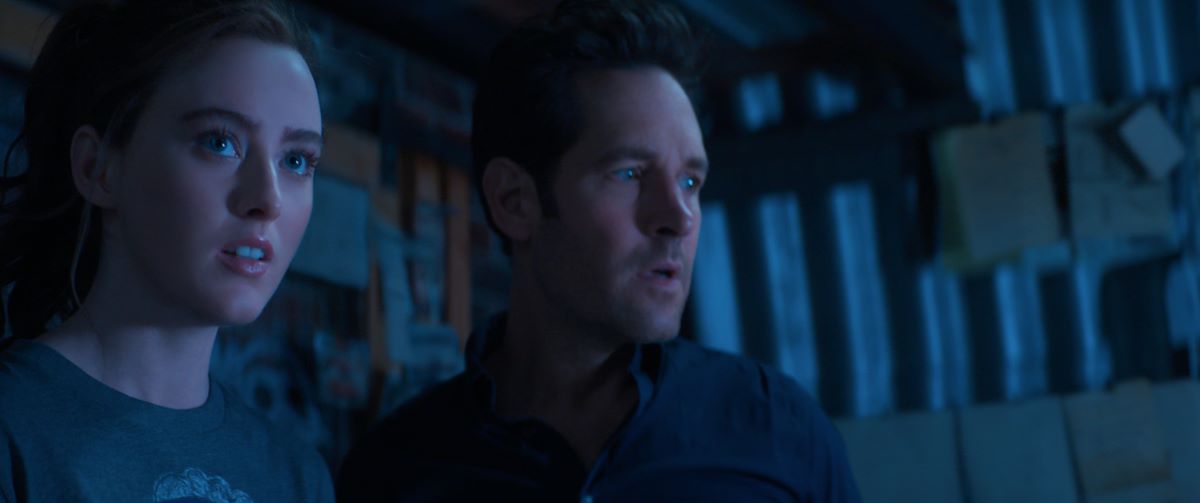 Scott Lang and Cassie Lang look frightened while staring at something off screen in Ant-Man and the Wasp: Quantumania.