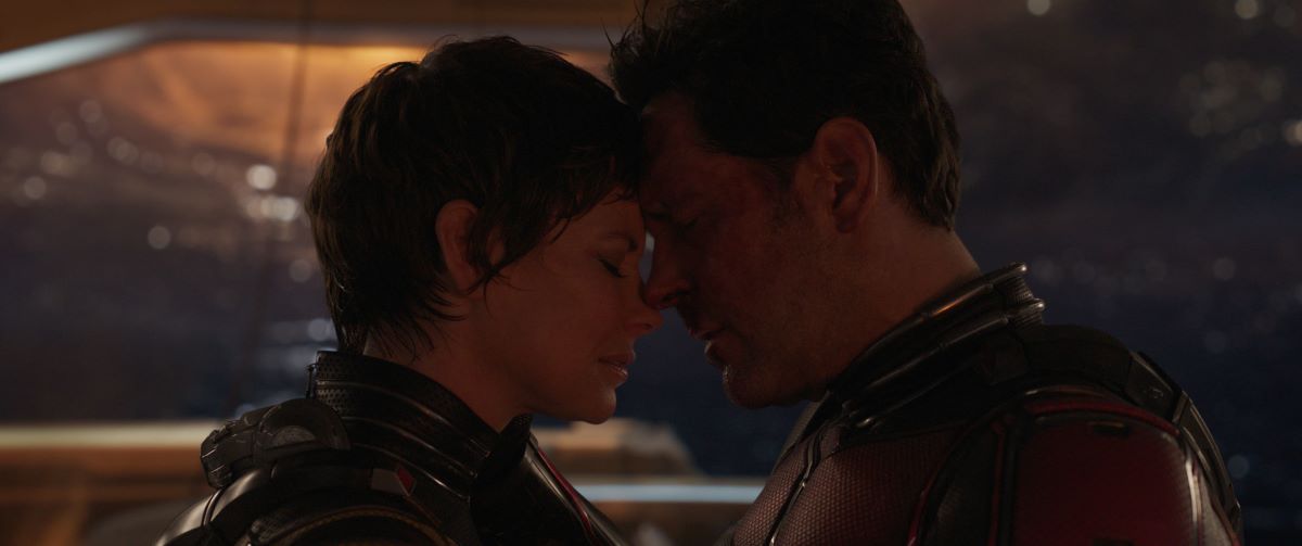 Hope van Dyne and Scott Lang touch foreheads in an intimate moment in Ant-Man and the Wasp: Quantumania.
