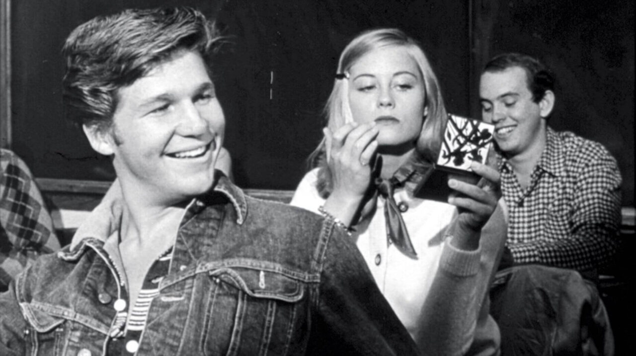 Jeff Bridges looks at Cybil Shepherd as she adjusts her make-up in Peter Bogdanovich's THE LAST PICTURE SHOW.