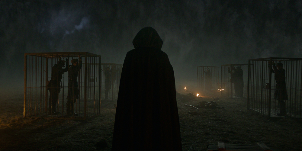 Kirigan emerging from the Fold with his shadow monsters.