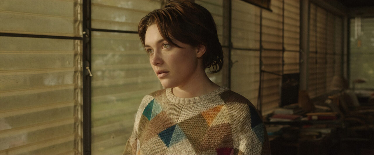 Florence Pugh looks out the window in A Good Person. 