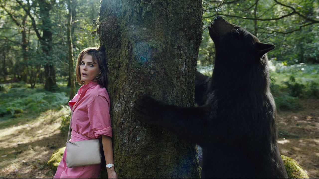 Sari (Keri Russell) hides from the Bear in Cocaine Bear
