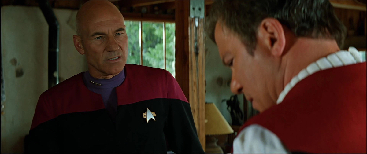 Patrick Stewart as Jean-Luc Picard and William Shatner as Captain James T. Kirk. They are in Kirk's cabin, which is actually a simulacrum inside the Nexus (or "Time Ribbon").