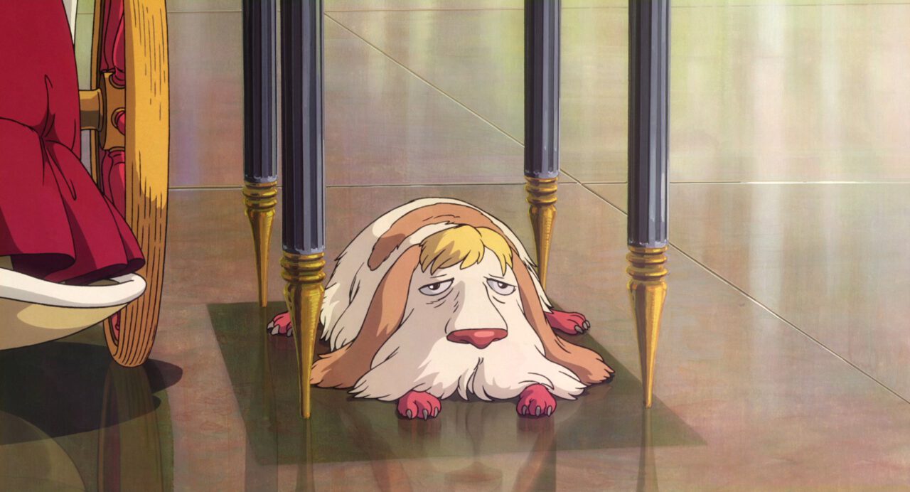 Heen, the dog, from Howl's Moving Castle laying on the floor.