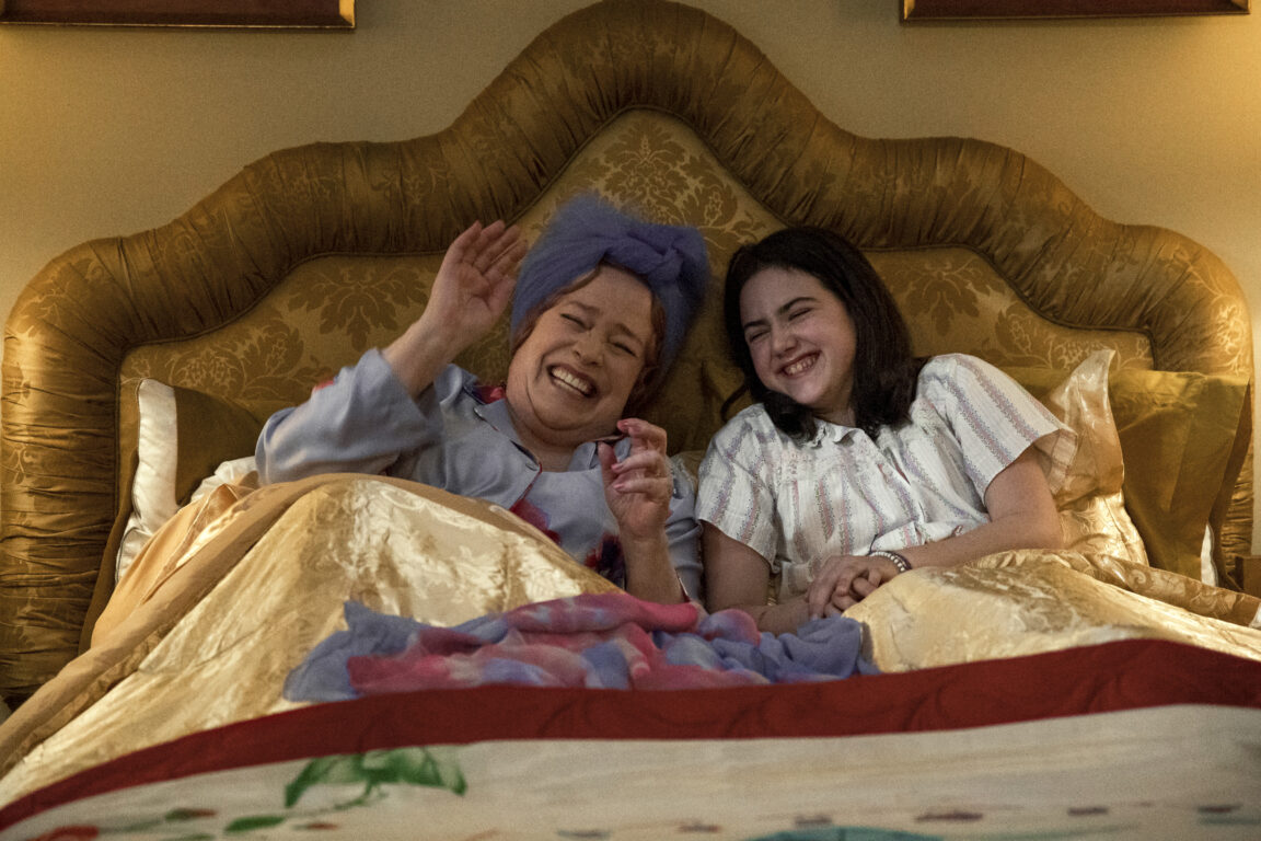 Kathy Bates and Abby Ryder Fortson giggle while they get ready for bed. 
