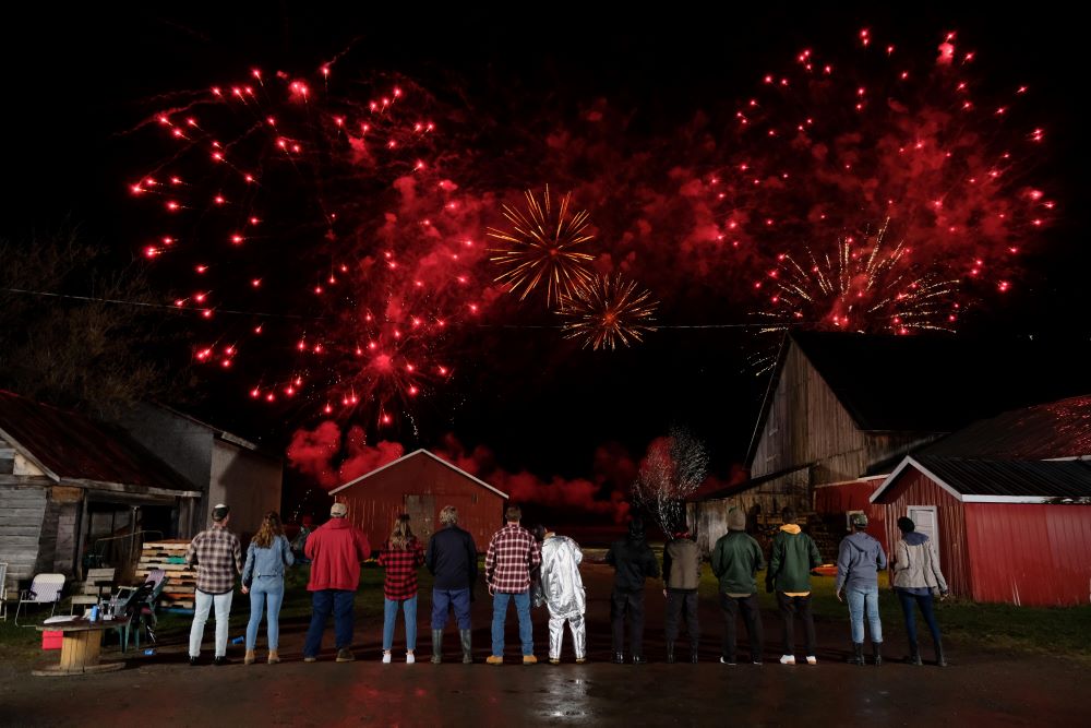 The hicks, skids and hockey players gather at night to watch a fireworks display in Letterkenny Season 11 Episode 7, "May 2-4."