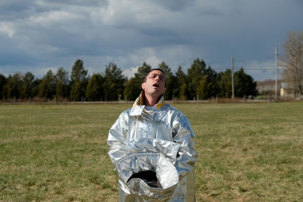 Glen wears a fire proximity suit while standing outside in Letterkenny Season 11 Episode 7, "May 2-4."