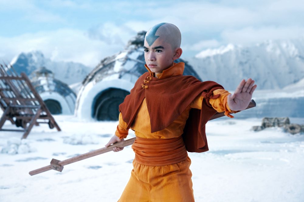 Aang stands outside in the snow while looking ready for battle in Avatar: The Last Airbender.