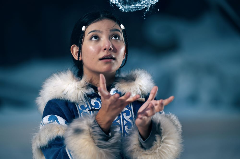 Katara wields water in a promotional photo for Avatar: The Last Airbender.