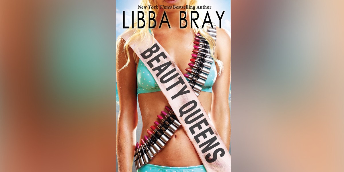 The cover of Beauty Queens by Libba Bray shows a blonde woman’s upper torso. She wears a bikini with two sashes. One sash says Beauty Queens, the other is an ammo belt.